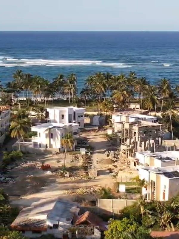 Aerial view of construction at Kite Beach Villas 1l with ocean in background